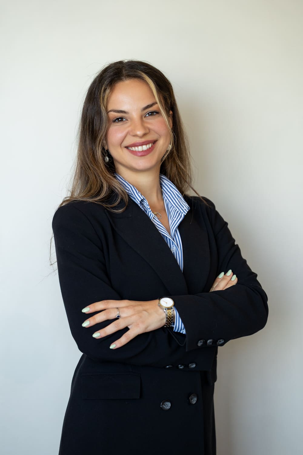 Chrysalina Parri, Associate, focusing on Corporate Law, Commercial Law, and real estate transactions.